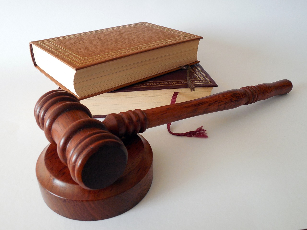 law books resting behind a gavel