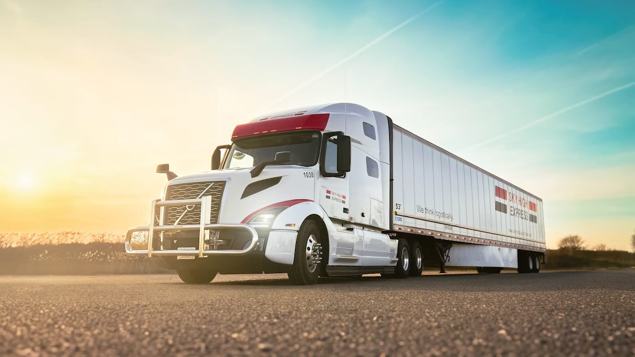 low-angle view of white transport truck